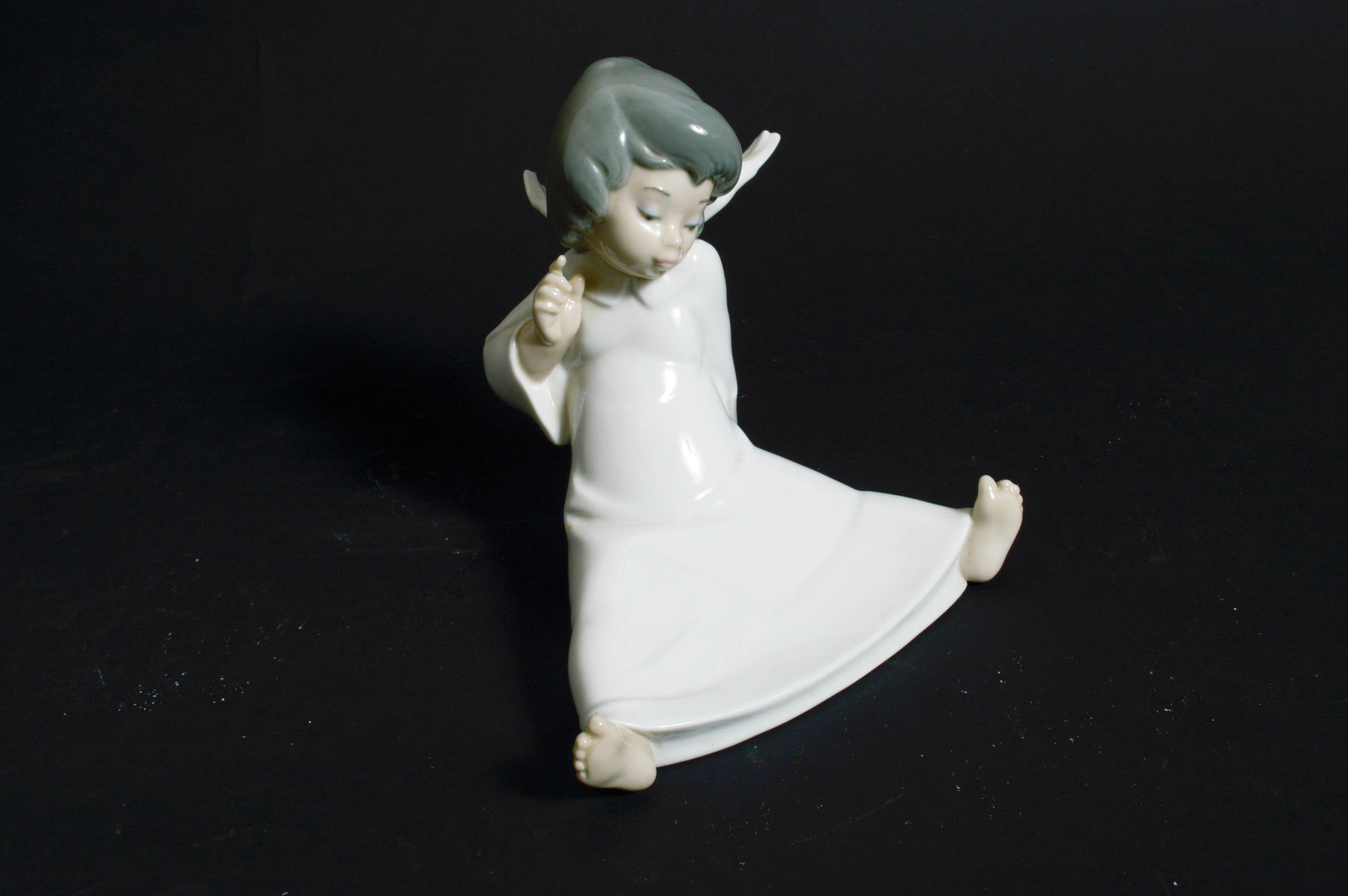 Lladró "Angel Wondering" Porcelain Figurine