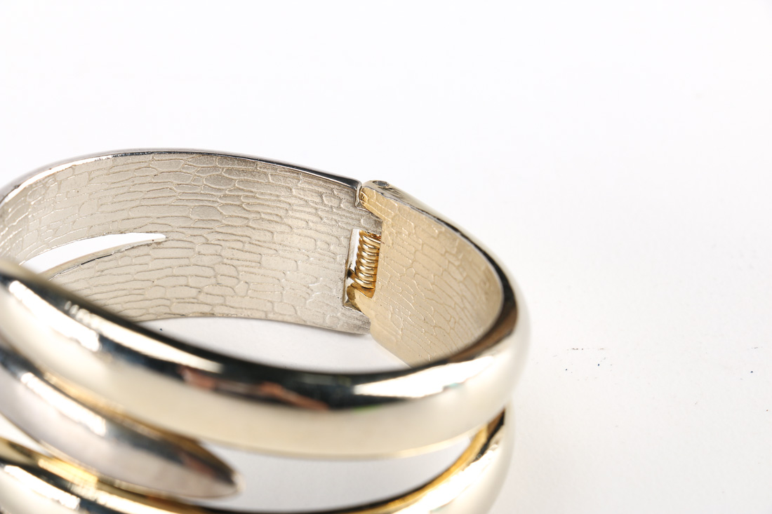 Assortment of Gold and Silver Tone Metal Costume Jewelry