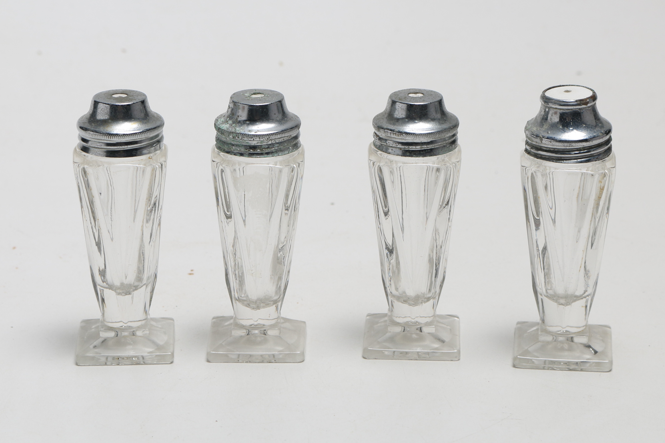 Collection of Vintage Salt and Pepper Shakers Including Sterling