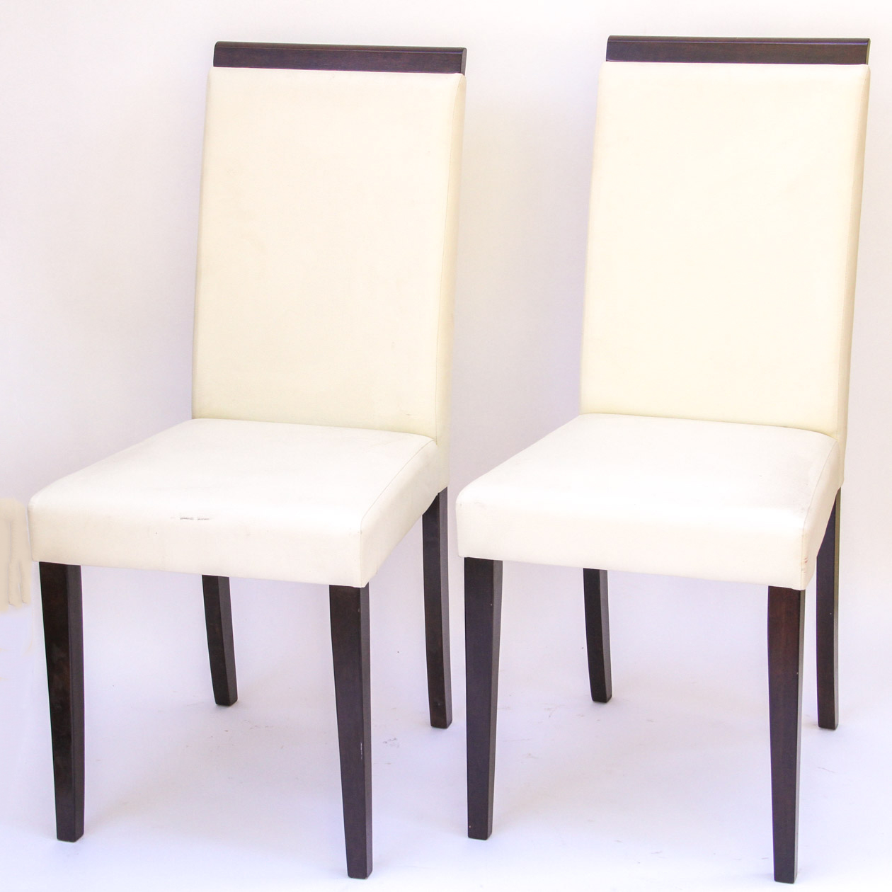Four Modern White Vinyl Chairs