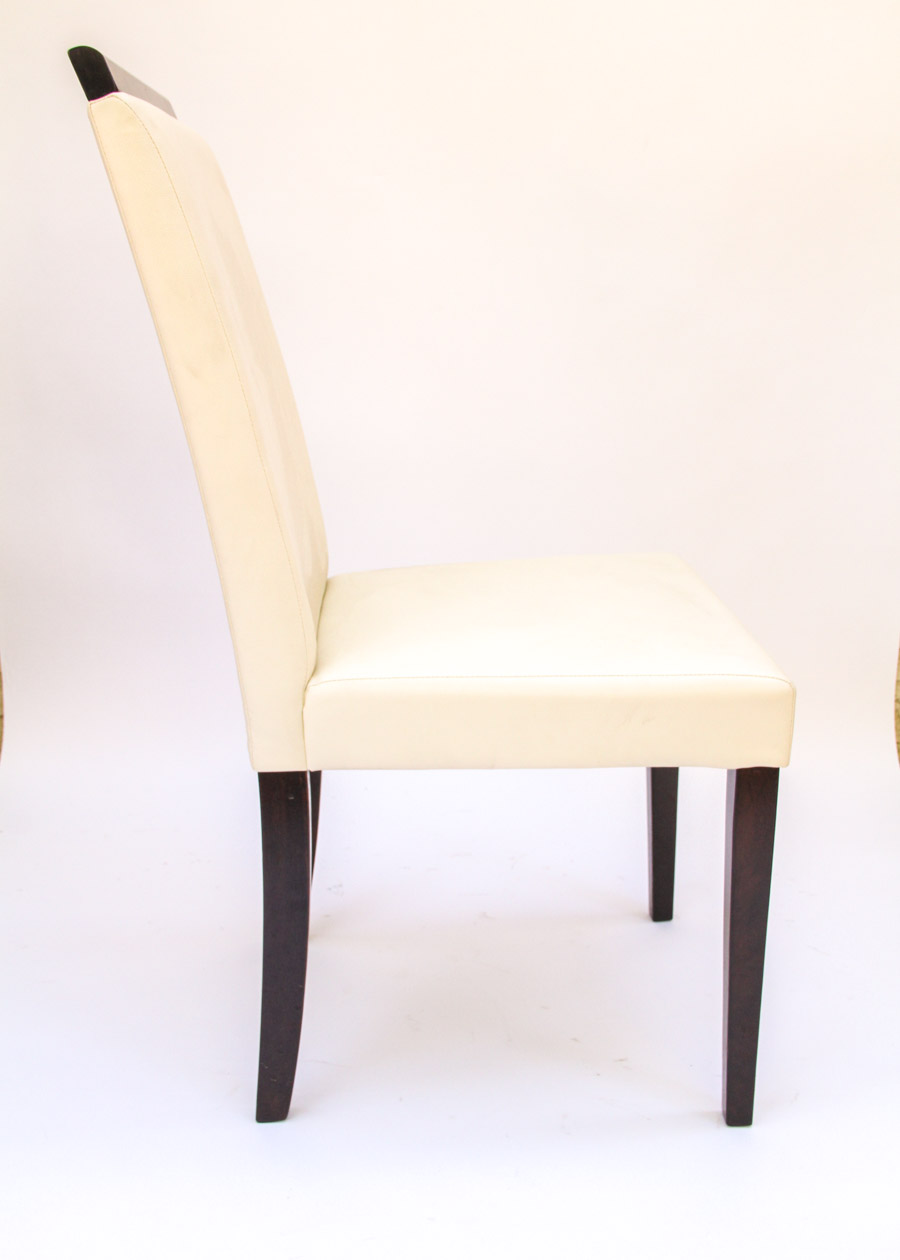 Four Modern White Vinyl Chairs