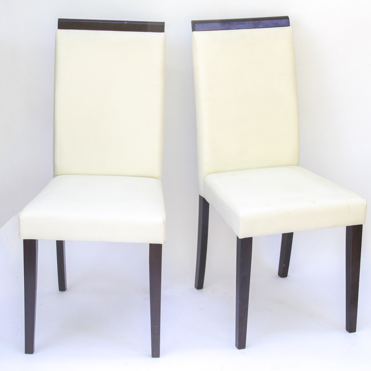 Four Modern White Vinyl Chairs