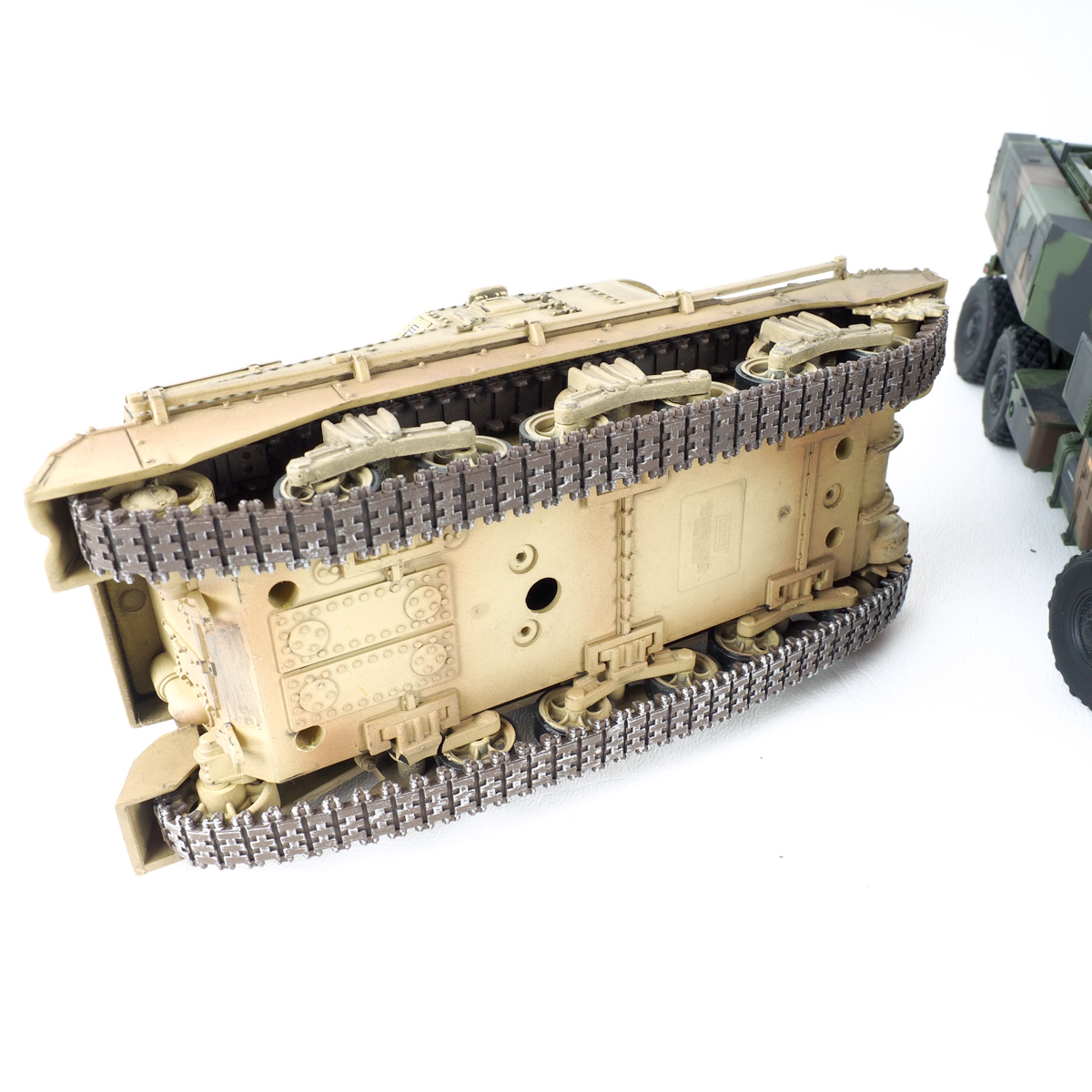 Collection of Toy Military Tanks and Trucks