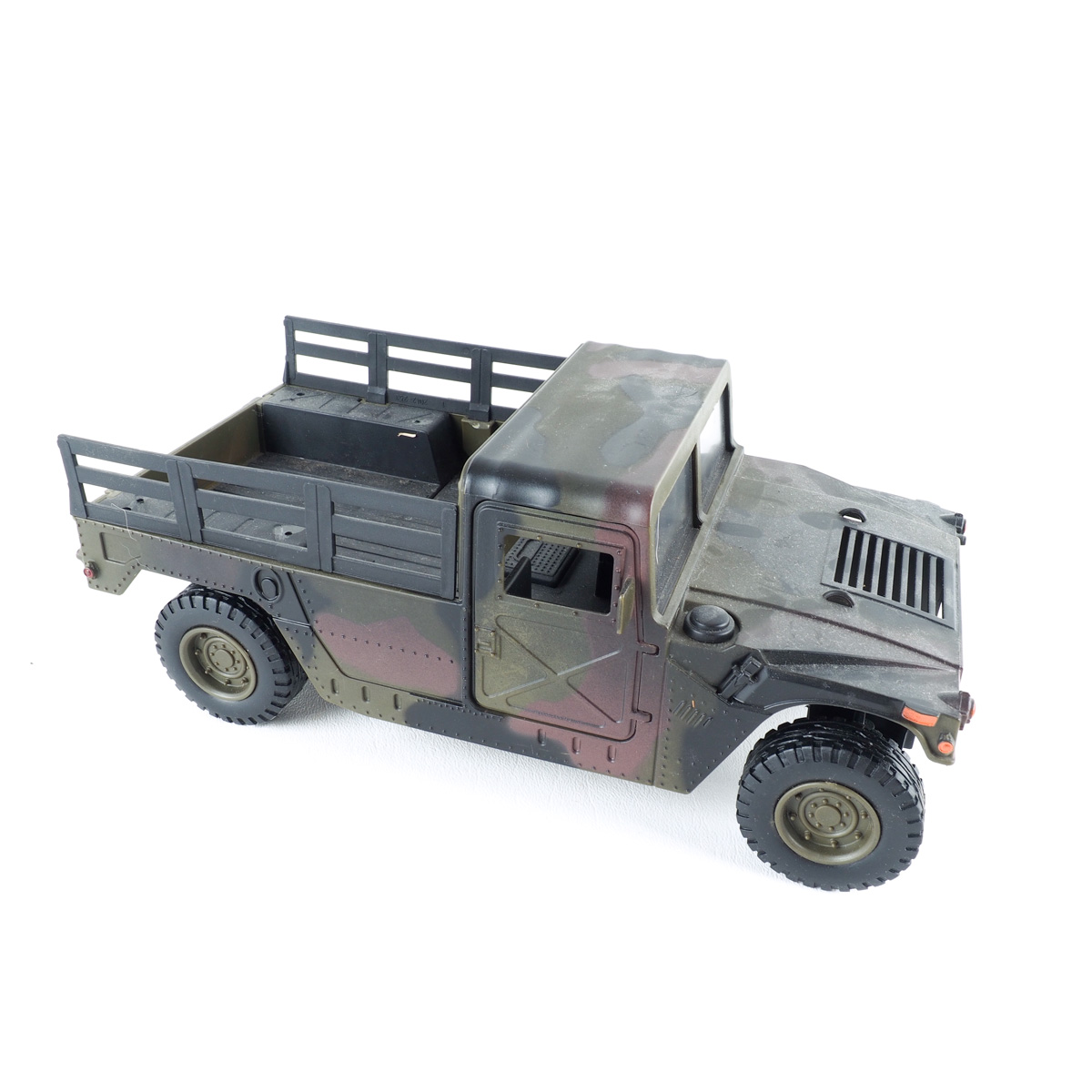 Collection of Toy Military Tanks and Trucks