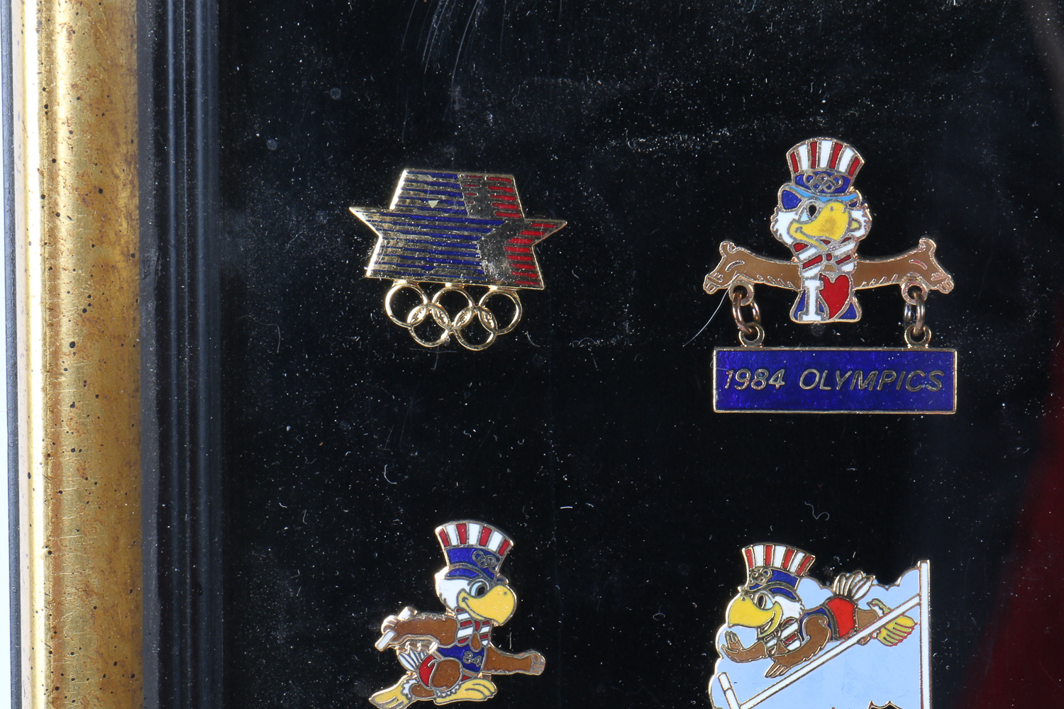 Framed Collection of 1984 Olympics Pins