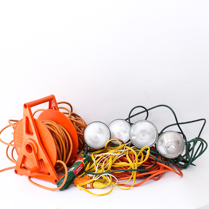 Assortment of Extension Cords and Outdoor lighting