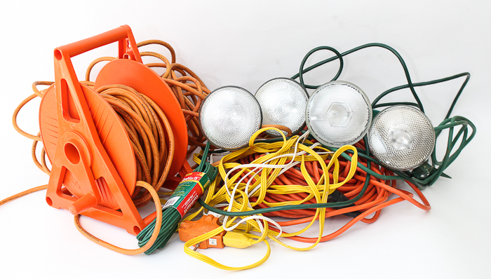 Assortment of Extension Cords and Outdoor lighting