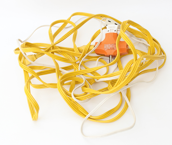 Assortment of Extension Cords and Outdoor lighting