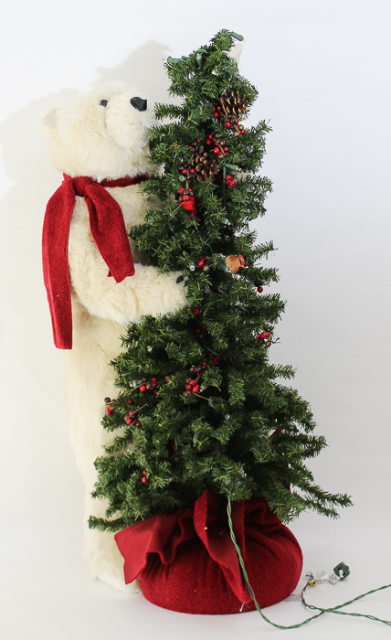 Polar Bear Hugging a Tree