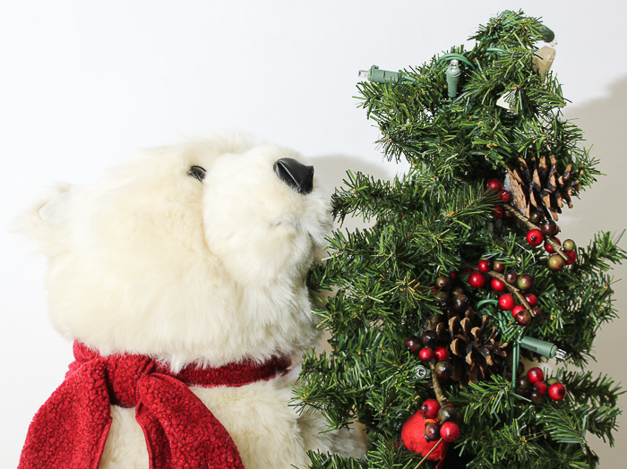 Polar Bear Hugging a Tree