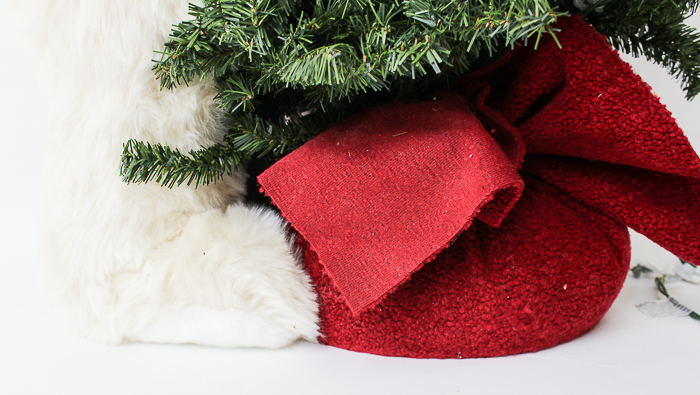 Polar Bear Hugging a Tree