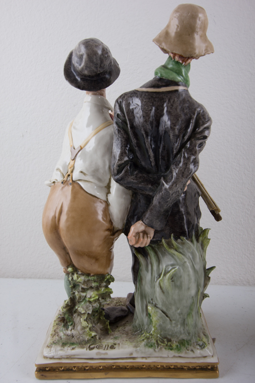 Pair of 1964 Galle Ceramic Fisherman Figurines