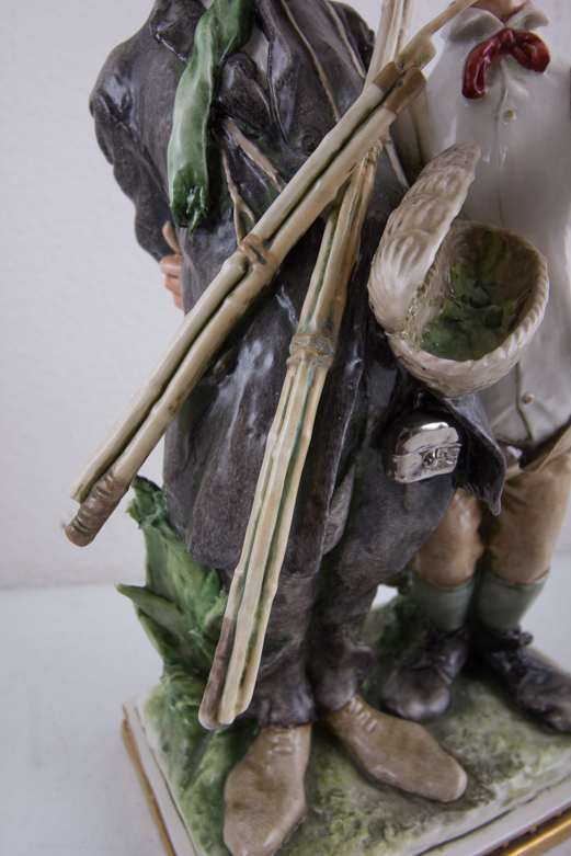 Pair of 1964 Galle Ceramic Fisherman Figurines