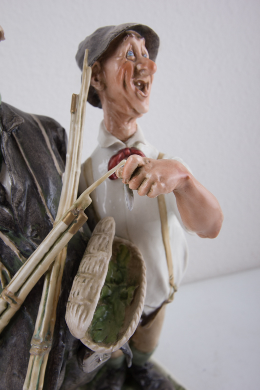 Pair of 1964 Galle Ceramic Fisherman Figurines