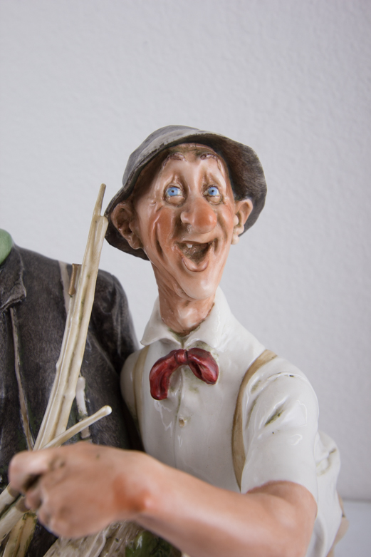 Pair of 1964 Galle Ceramic Fisherman Figurines