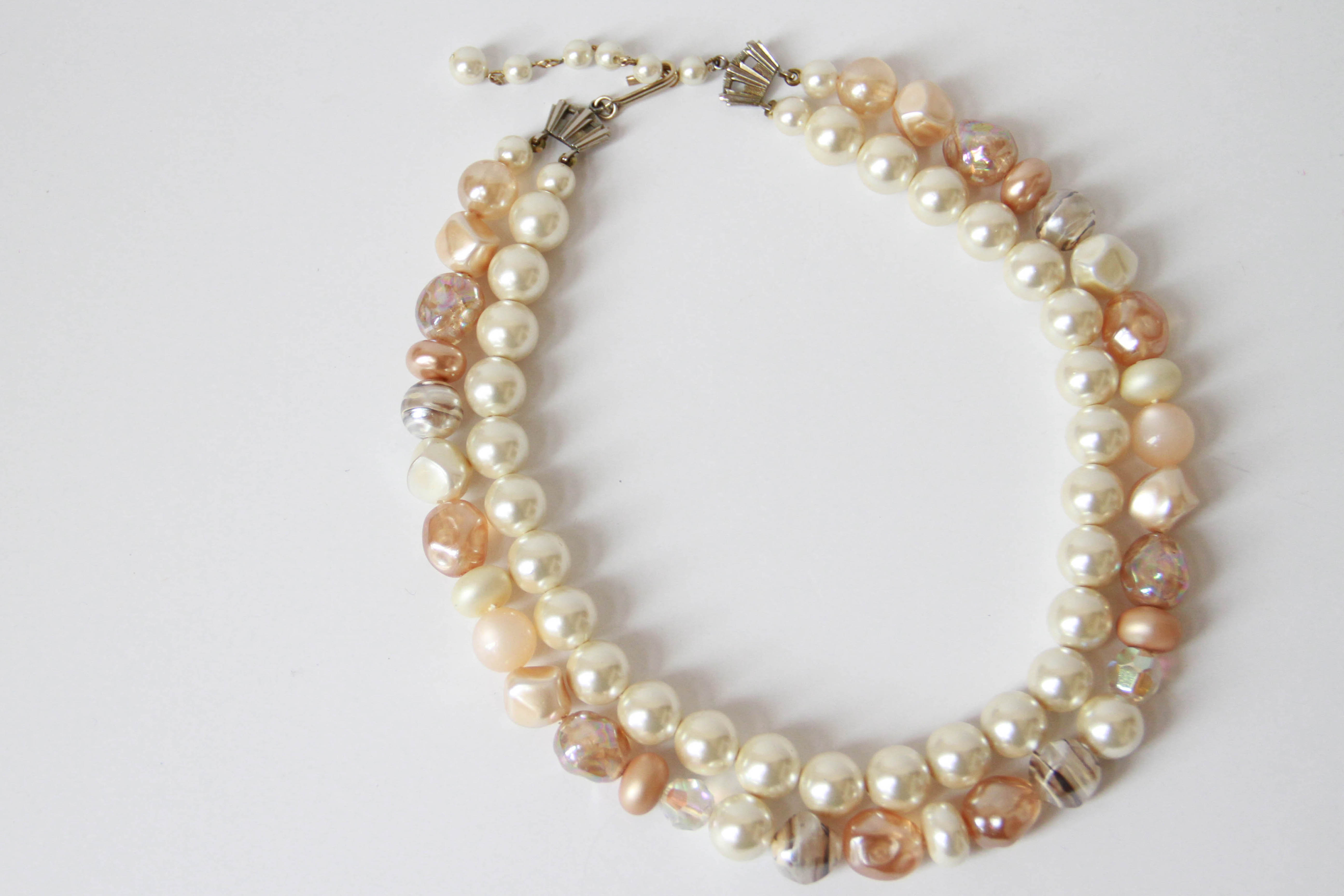 Assortment of White and Gold Tone Jewelry