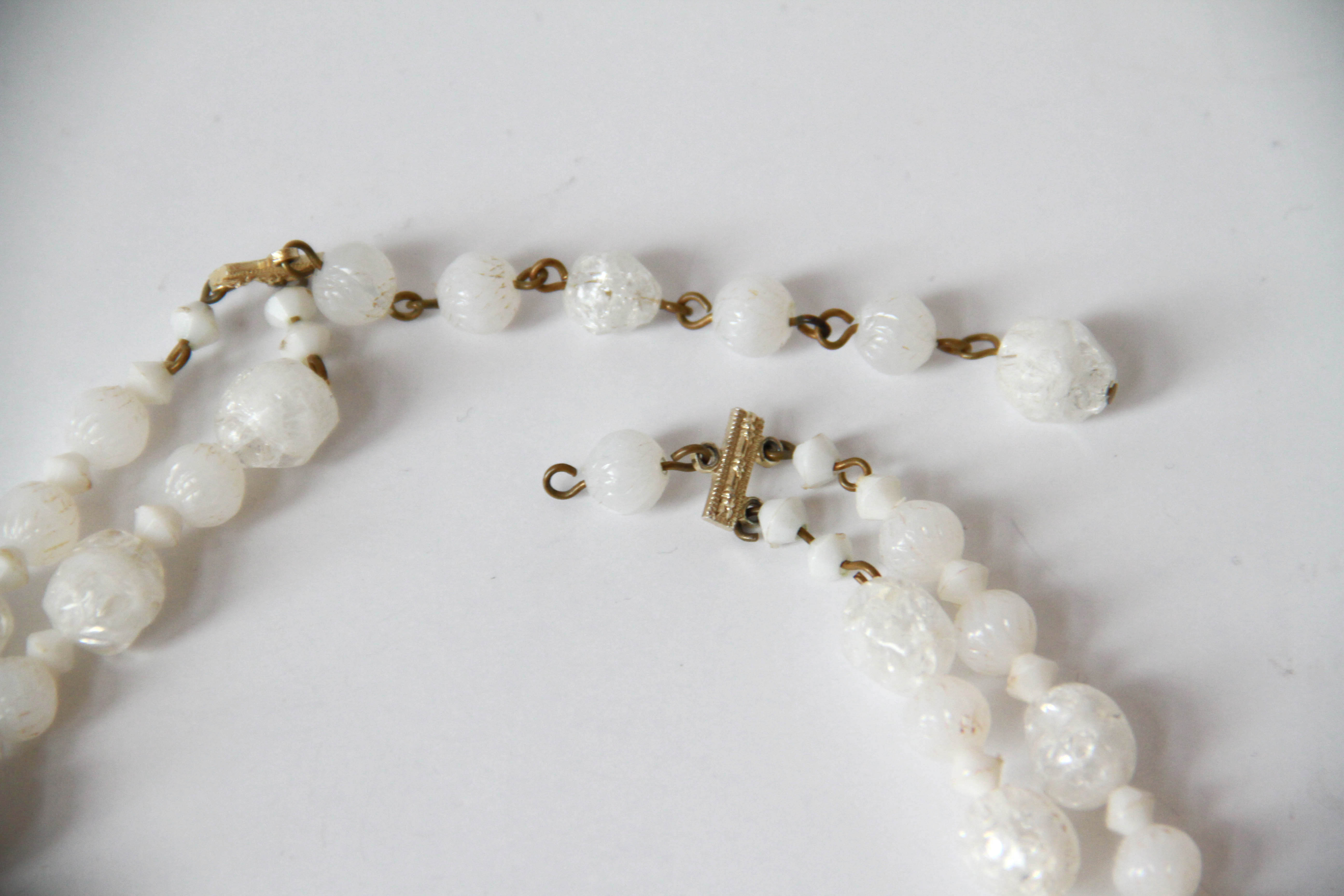 Assortment of White and Gold Tone Jewelry