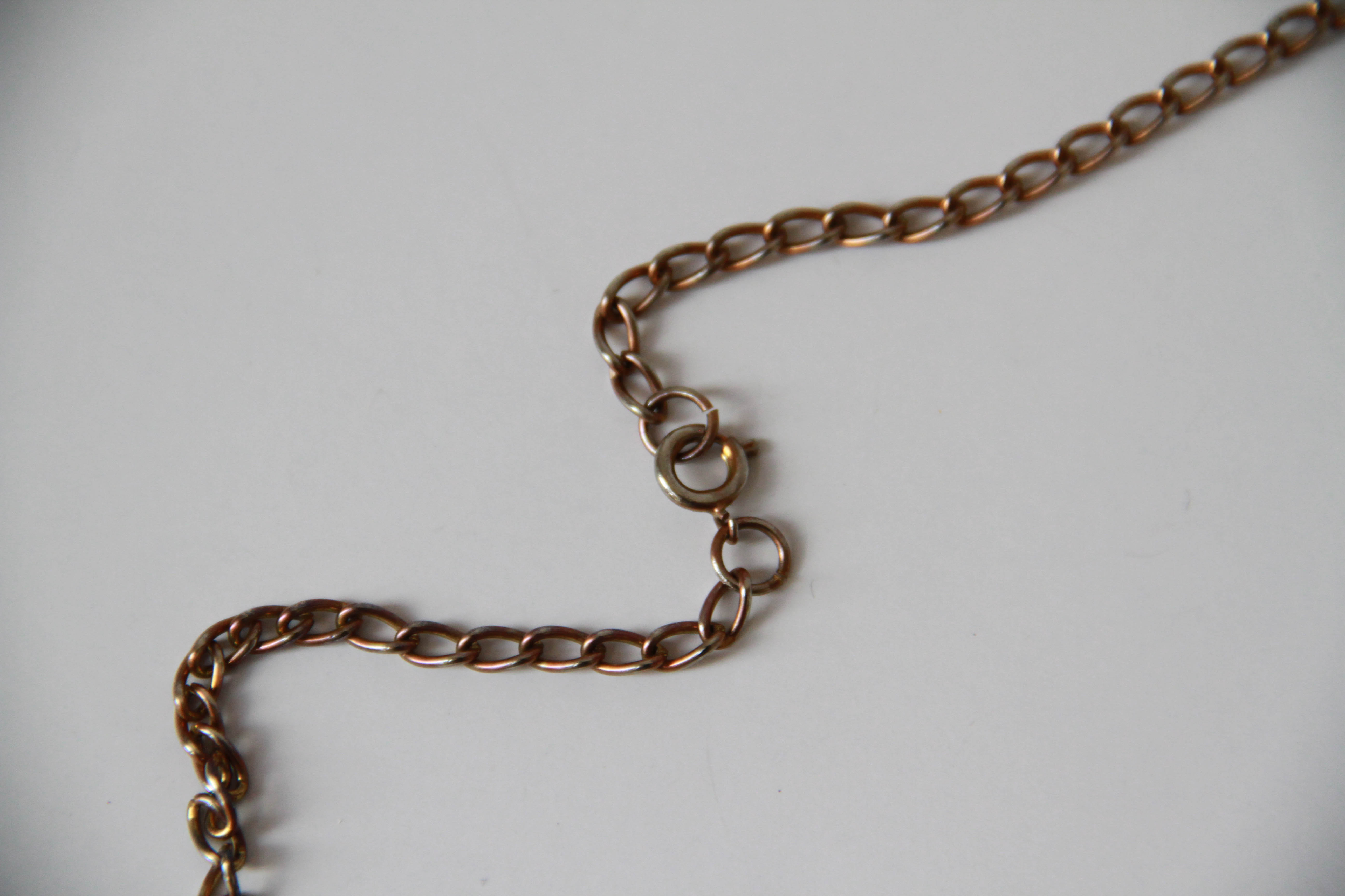 Assortment of White and Gold Tone Jewelry