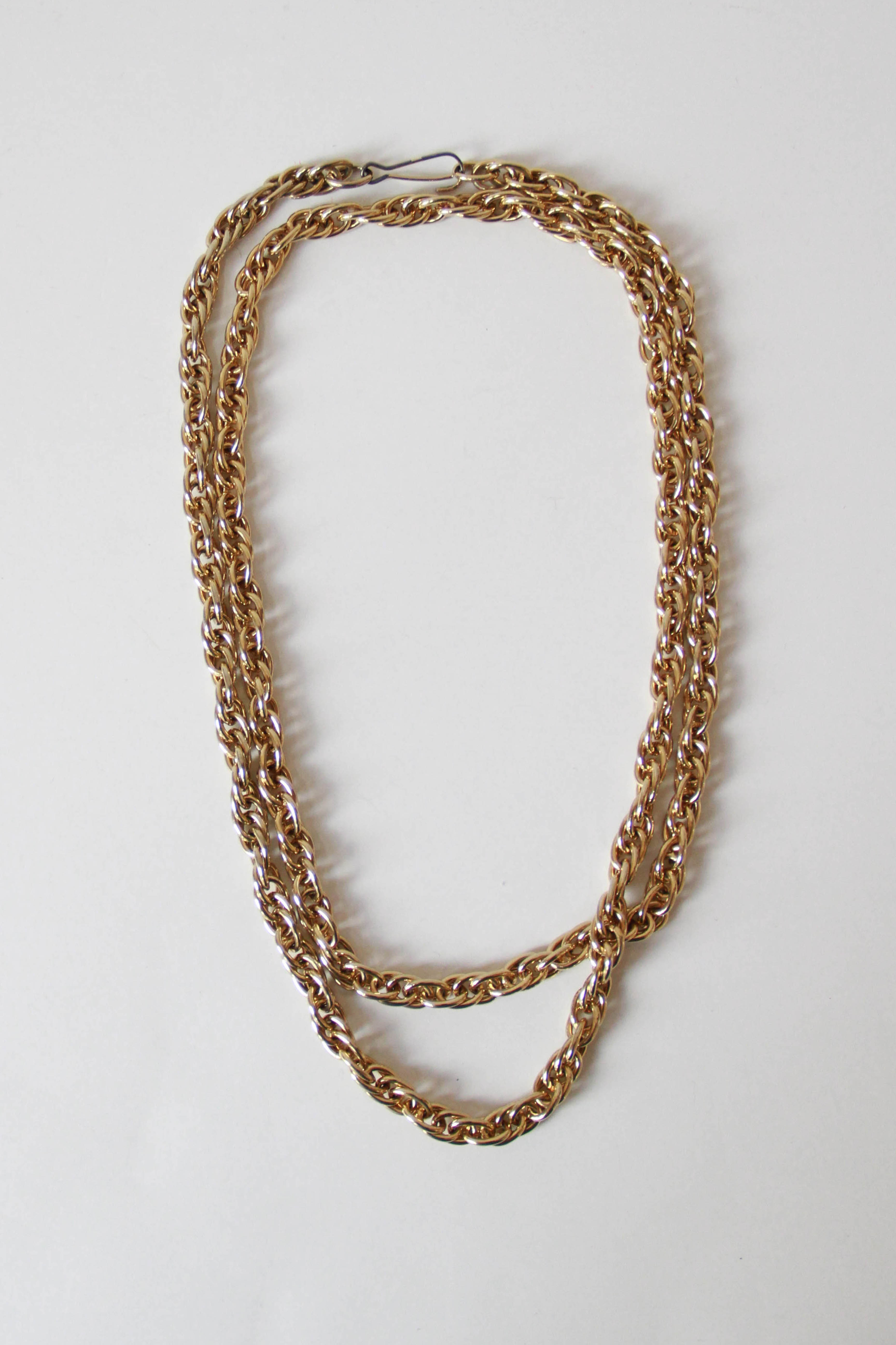 Assortment of White and Gold Tone Jewelry