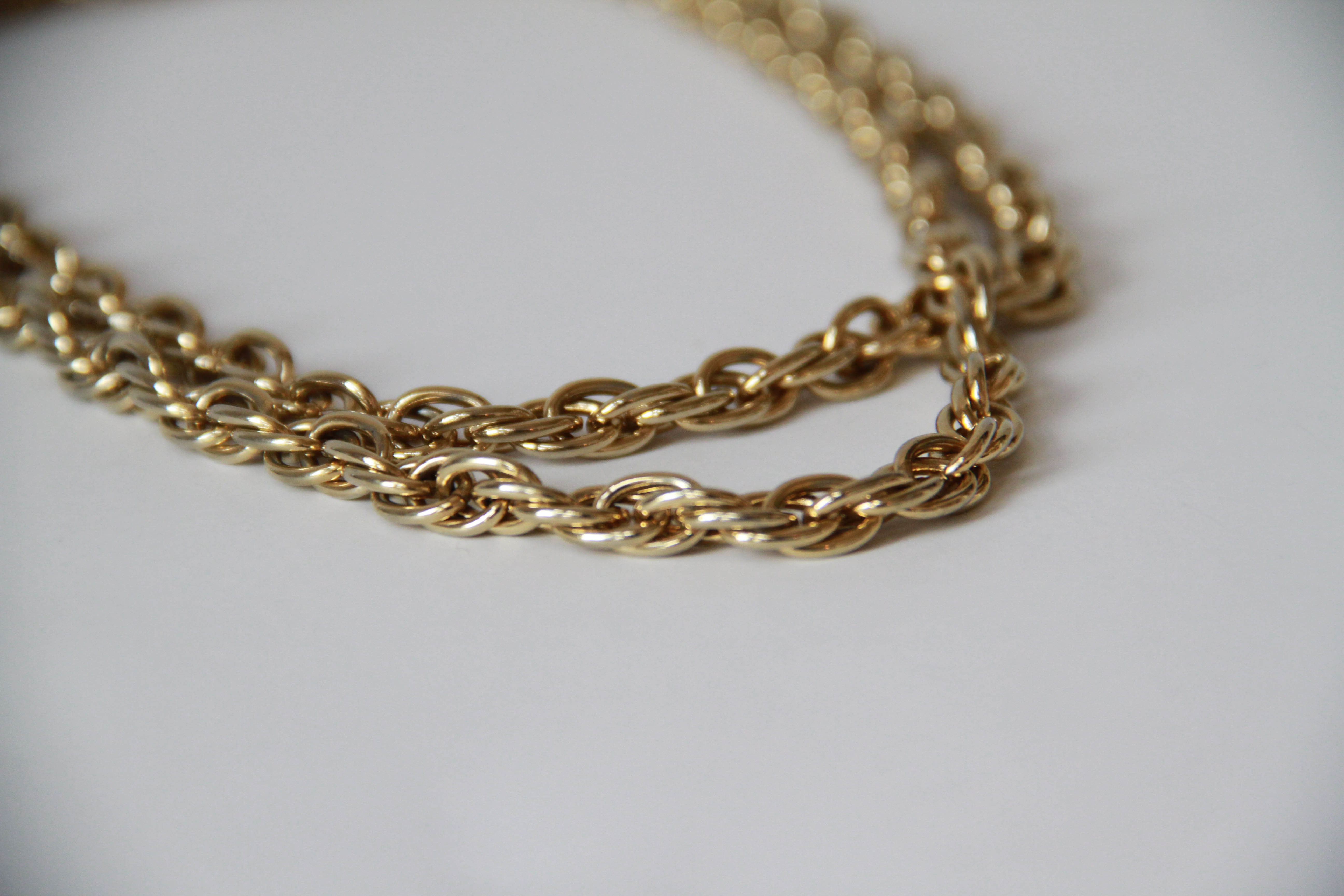 Assortment of White and Gold Tone Jewelry