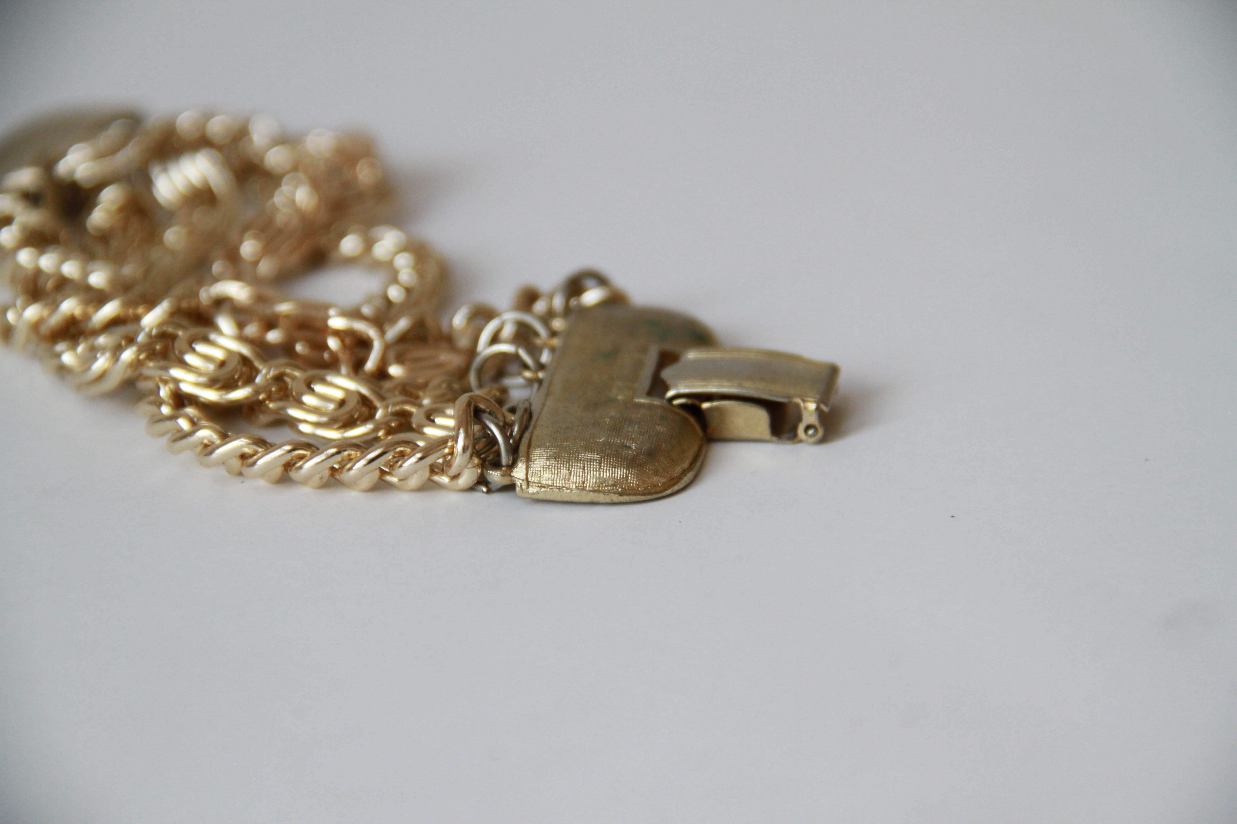 Assortment of White and Gold Tone Jewelry