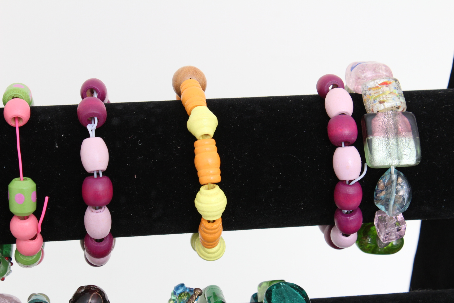 Collection of Beaded Bracelets with Jewelry Display Stand