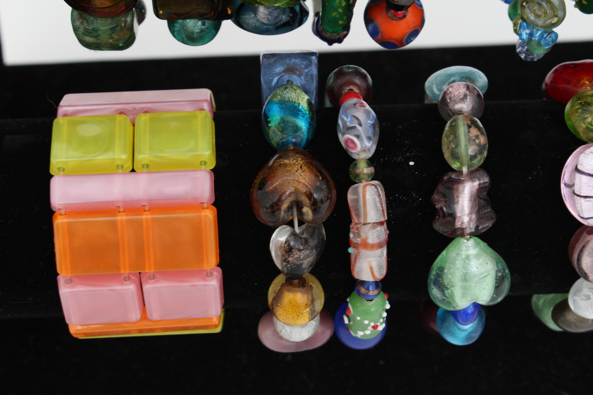 Collection of Beaded Bracelets with Jewelry Display Stand