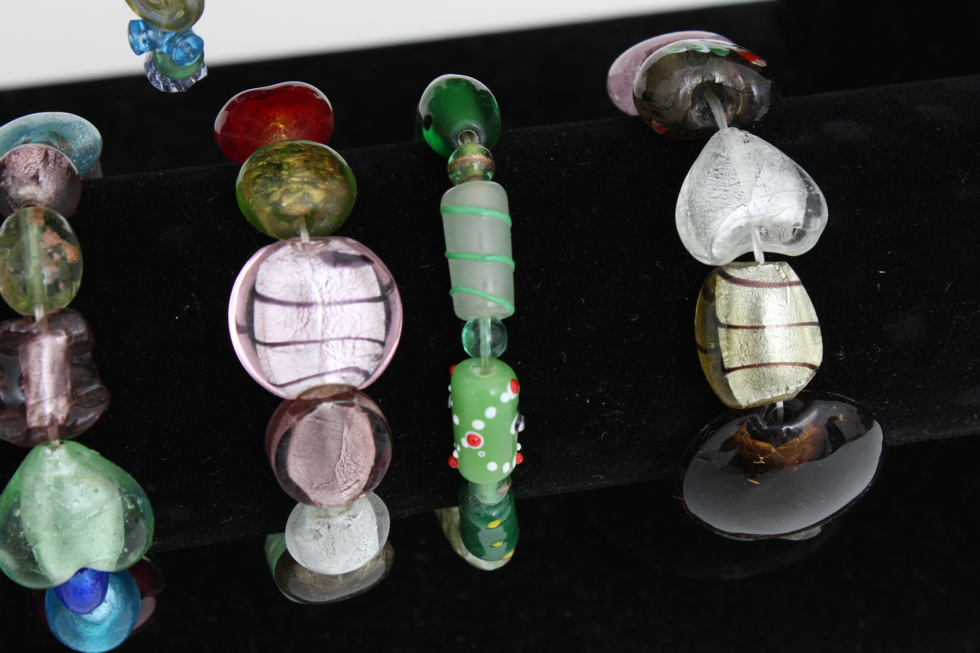 Collection of Beaded Bracelets with Jewelry Display Stand