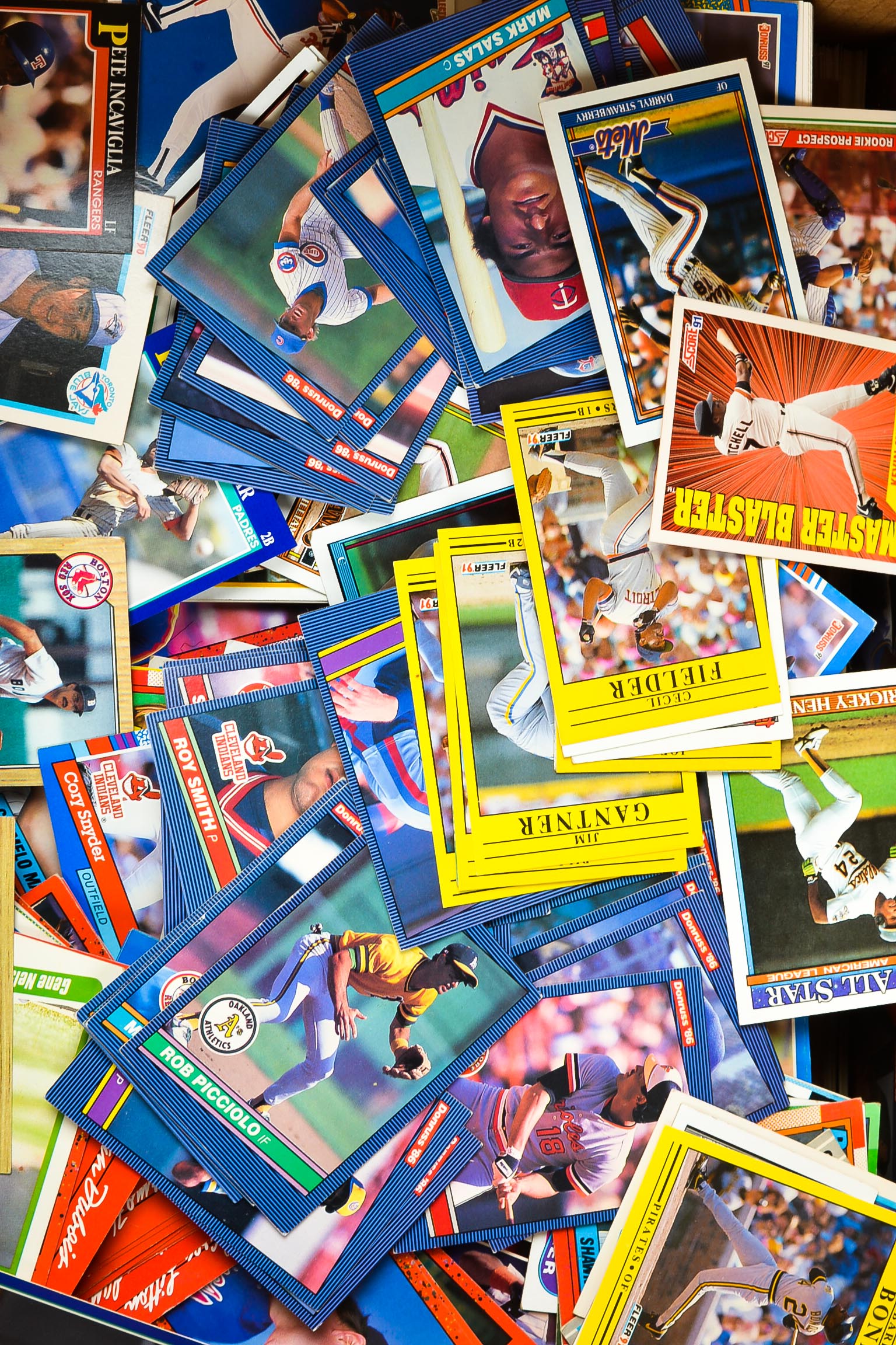 Assortment of Baseball Cards with NFL Cards