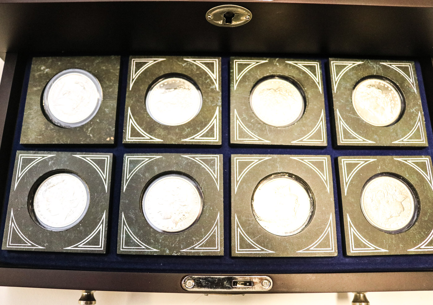 Collection of Sixteen Uncirculated Morgan Silver Dollars