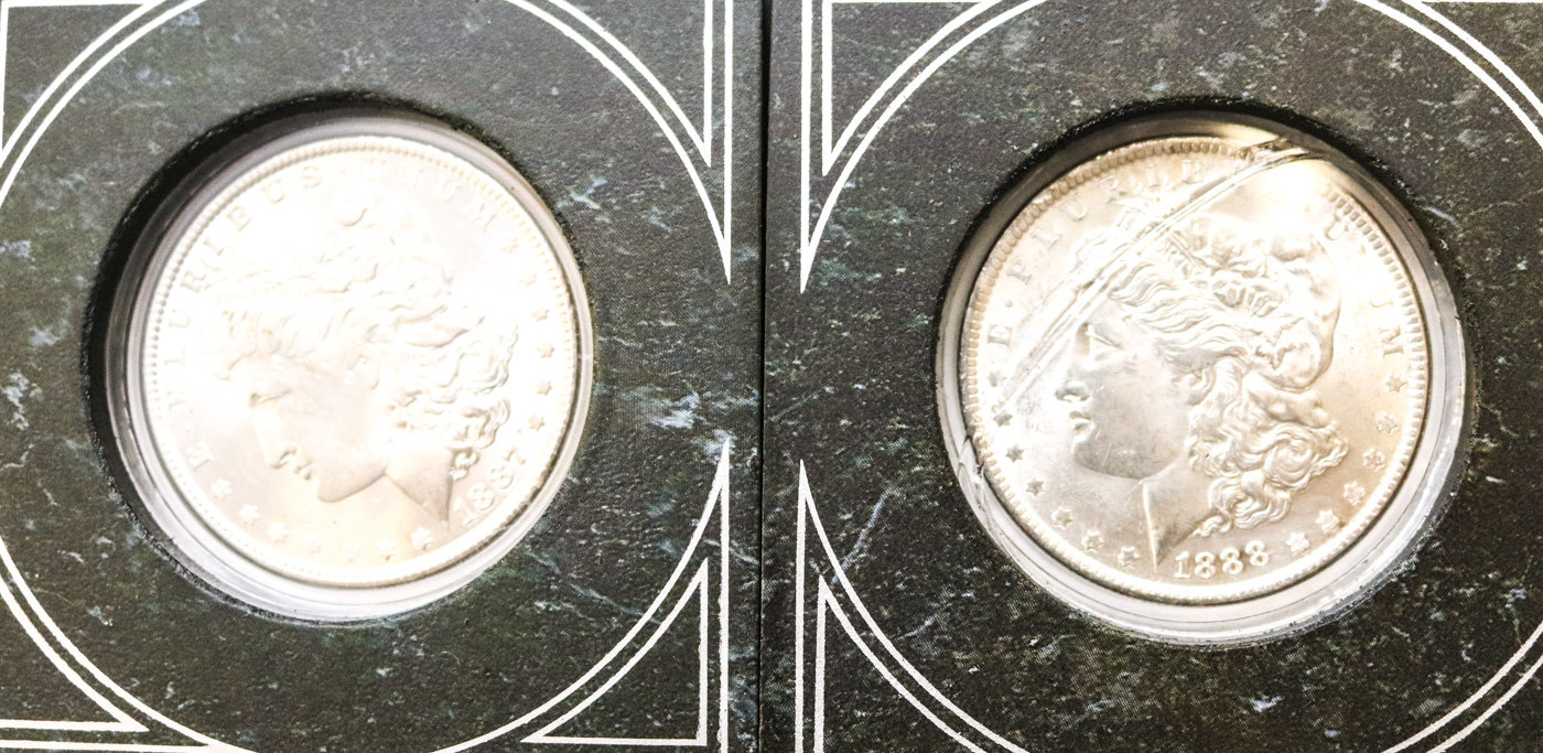 Collection of Sixteen Uncirculated Morgan Silver Dollars