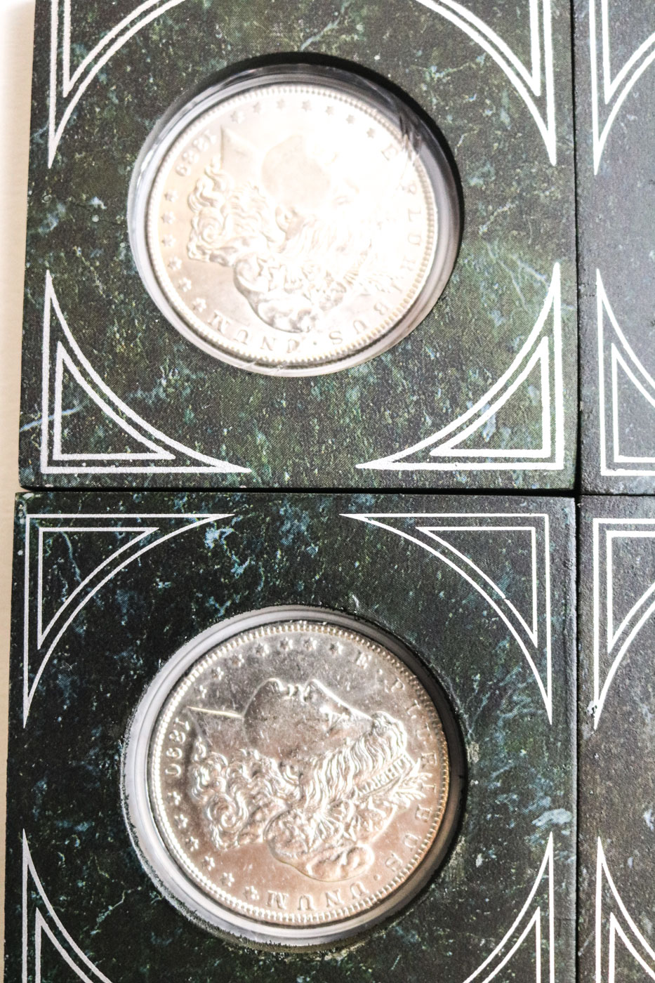 Collection of Sixteen Uncirculated Morgan Silver Dollars