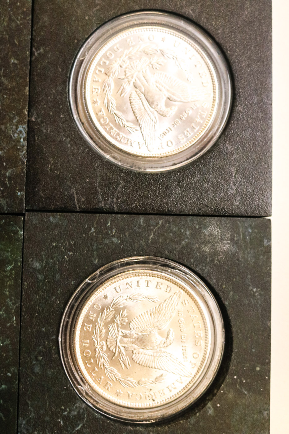 Collection of Sixteen Uncirculated Morgan Silver Dollars