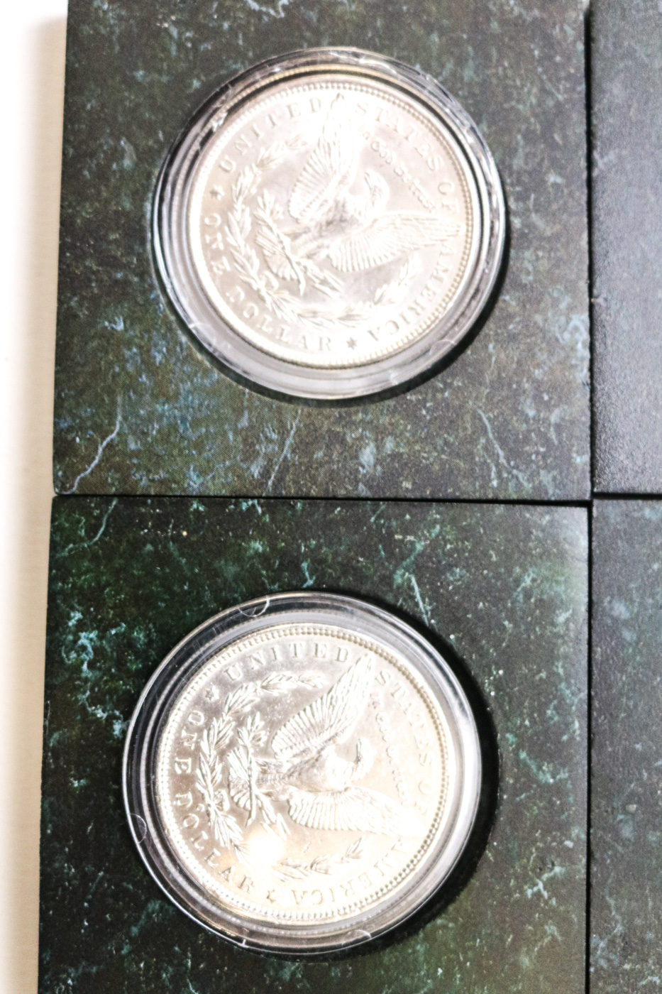 Collection of Sixteen Uncirculated Morgan Silver Dollars