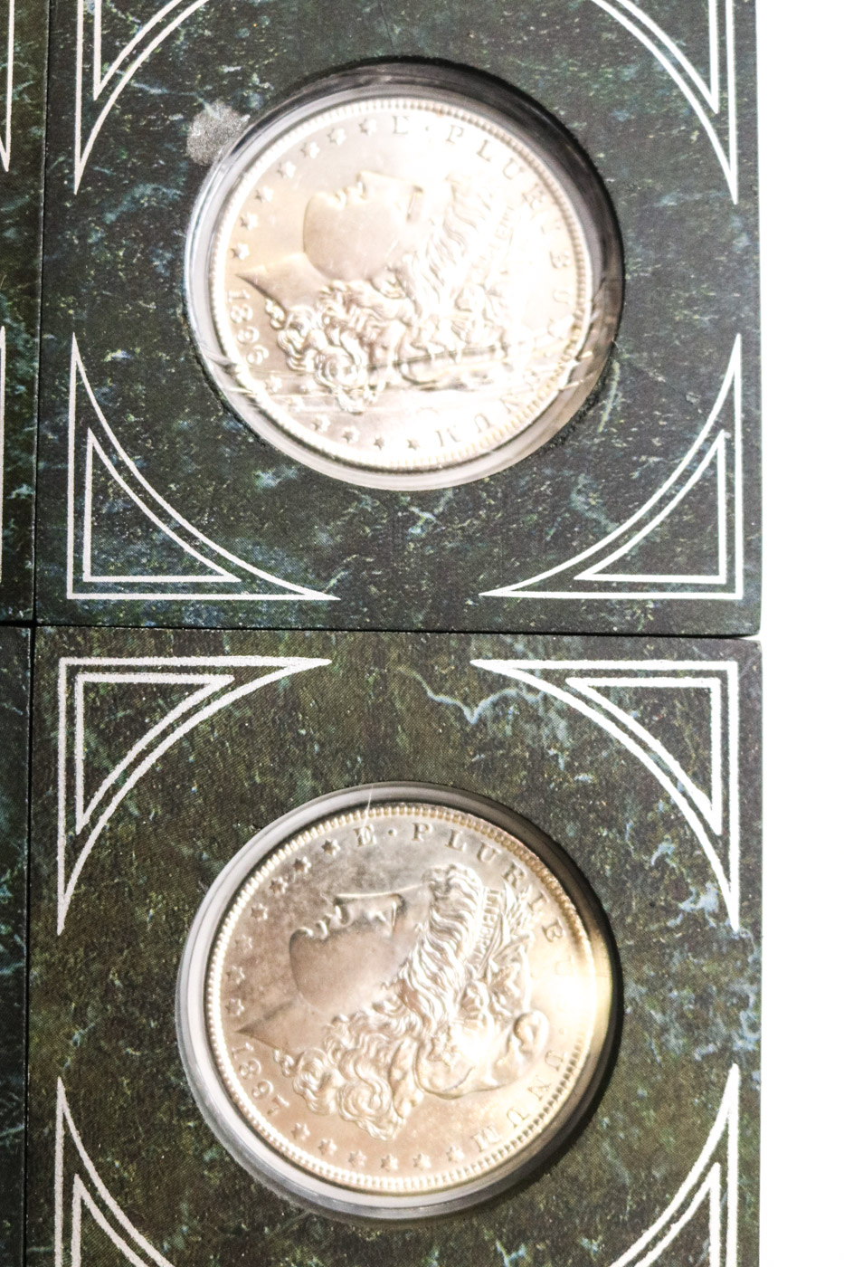 Collection of Sixteen Uncirculated Morgan Silver Dollars