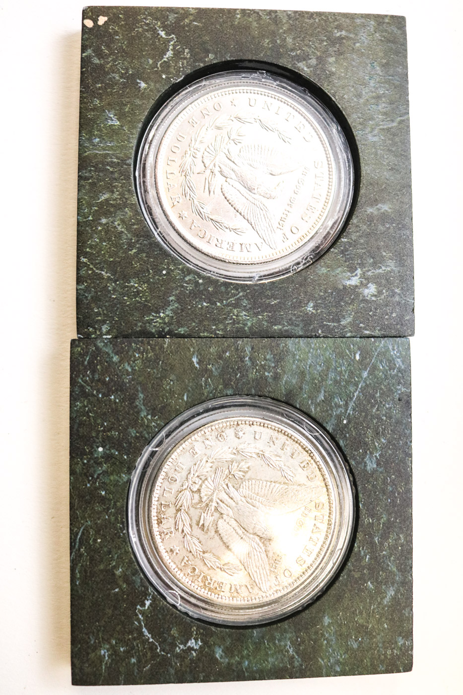 Collection of Sixteen Uncirculated Morgan Silver Dollars