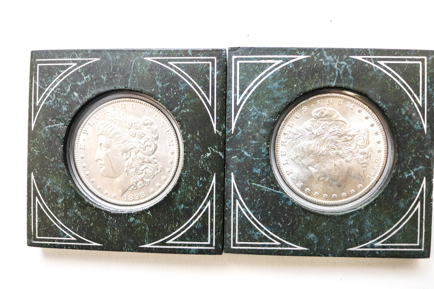 Collection of Sixteen Uncirculated Morgan Silver Dollars