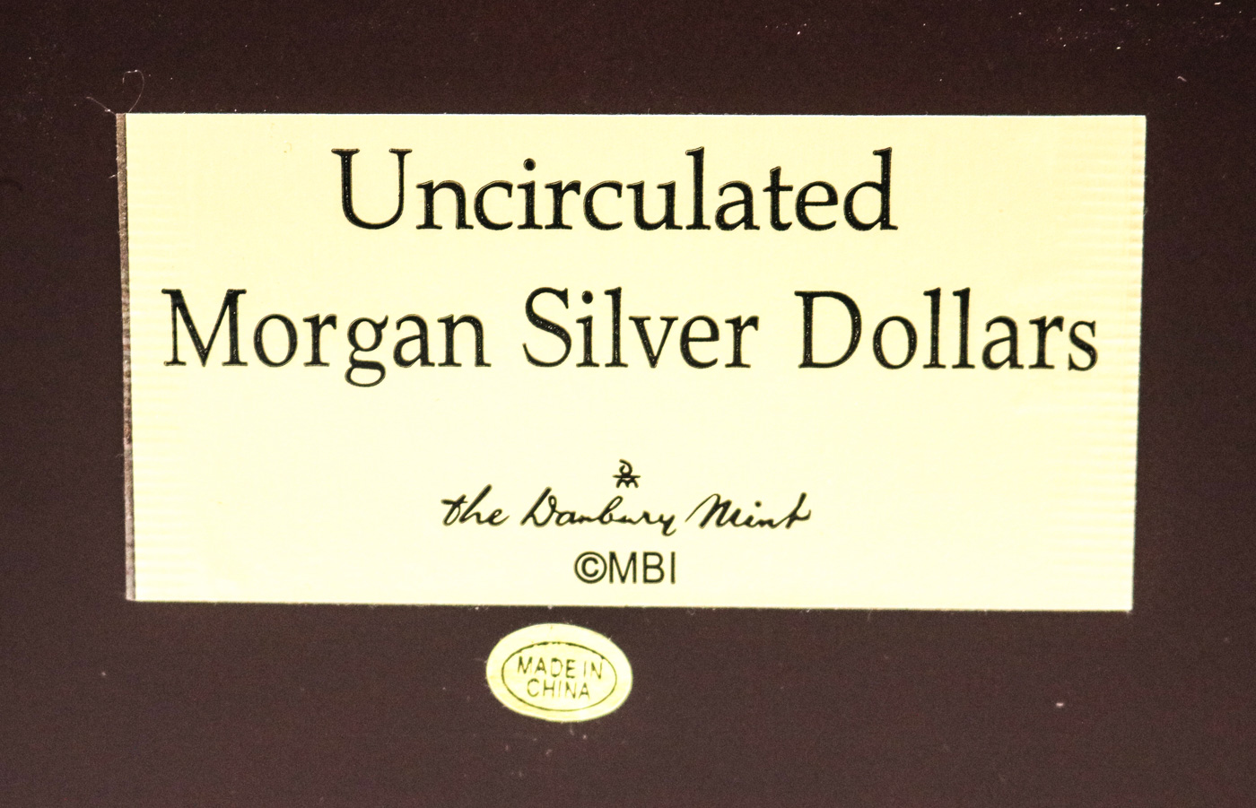 Collection of Sixteen Uncirculated Morgan Silver Dollars