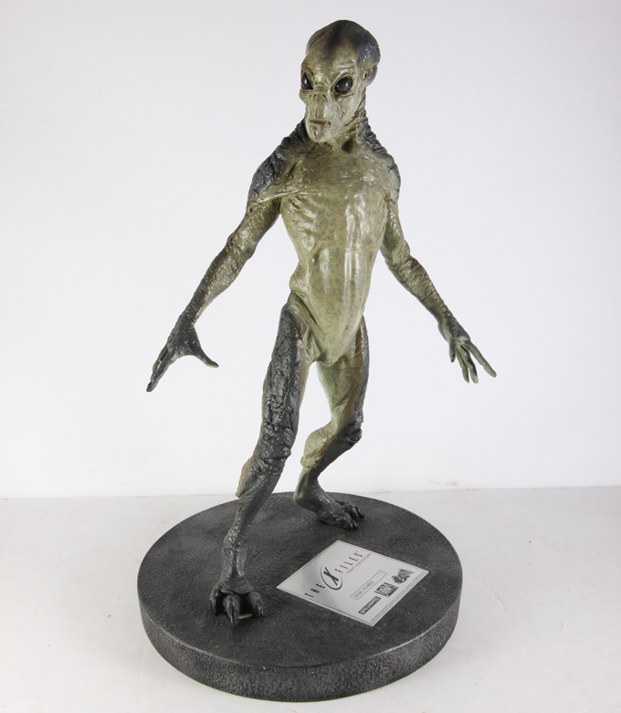 X-Files Alien Figurine and Book Titled "UFO...Contact From The Pleiades, Volume I"
