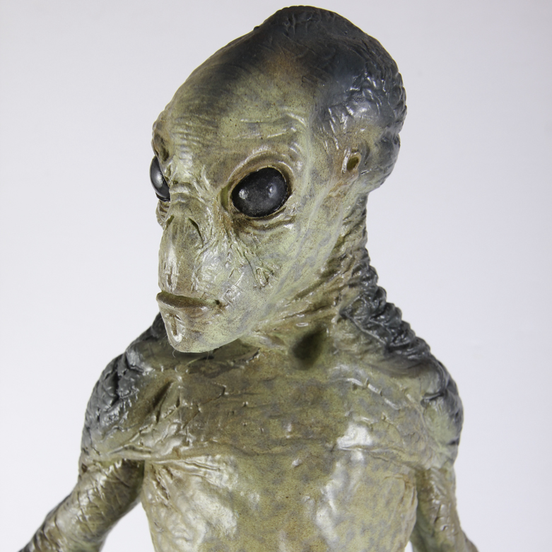 X-Files Alien Figurine and Book Titled "UFO...Contact From The Pleiades, Volume I"