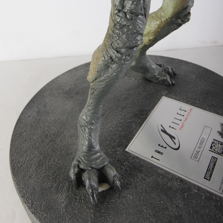 X-Files Alien Figurine and Book Titled "UFO...Contact From The Pleiades, Volume I"