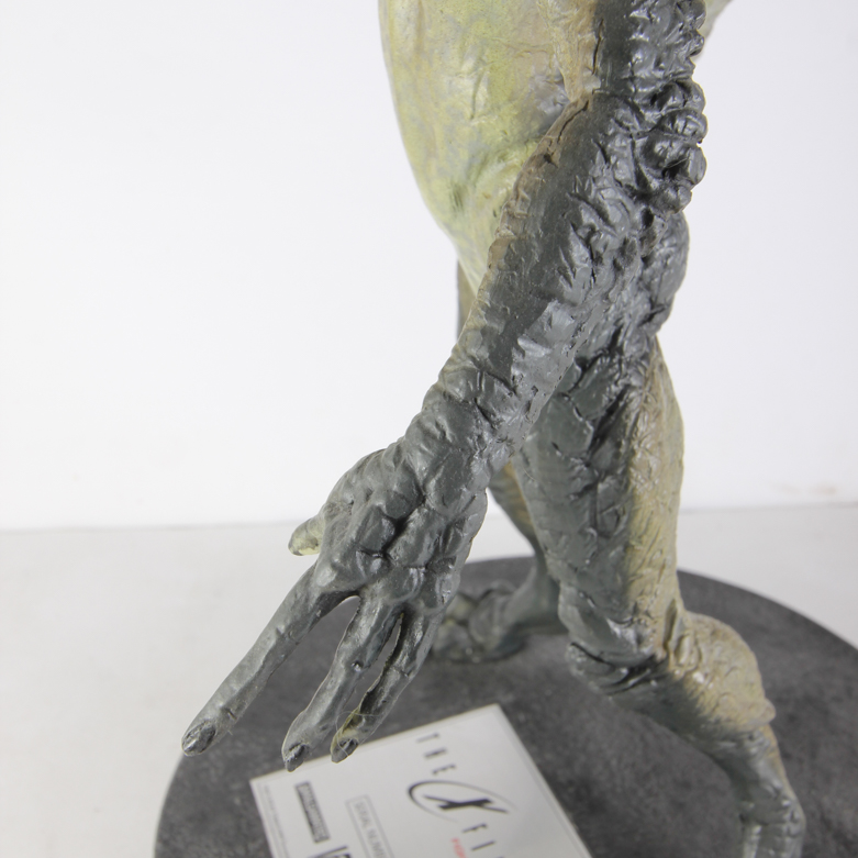 X-Files Alien Figurine and Book Titled "UFO...Contact From The Pleiades, Volume I"