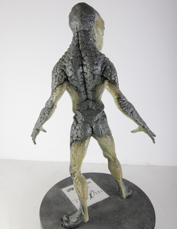 X-Files Alien Figurine and Book Titled "UFO...Contact From The Pleiades, Volume I"