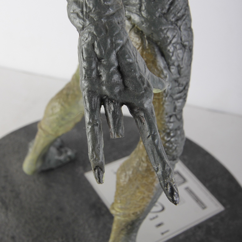 X-Files Alien Figurine and Book Titled "UFO...Contact From The Pleiades, Volume I"