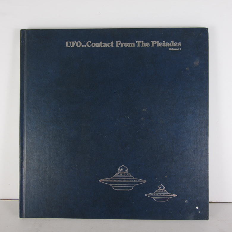 X-Files Alien Figurine and Book Titled "UFO...Contact From The Pleiades, Volume I"