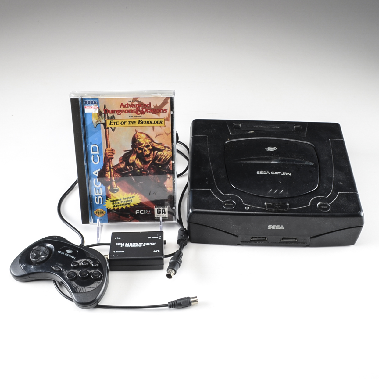 Sega Saturn Game Console with "Eye of the Beholder"