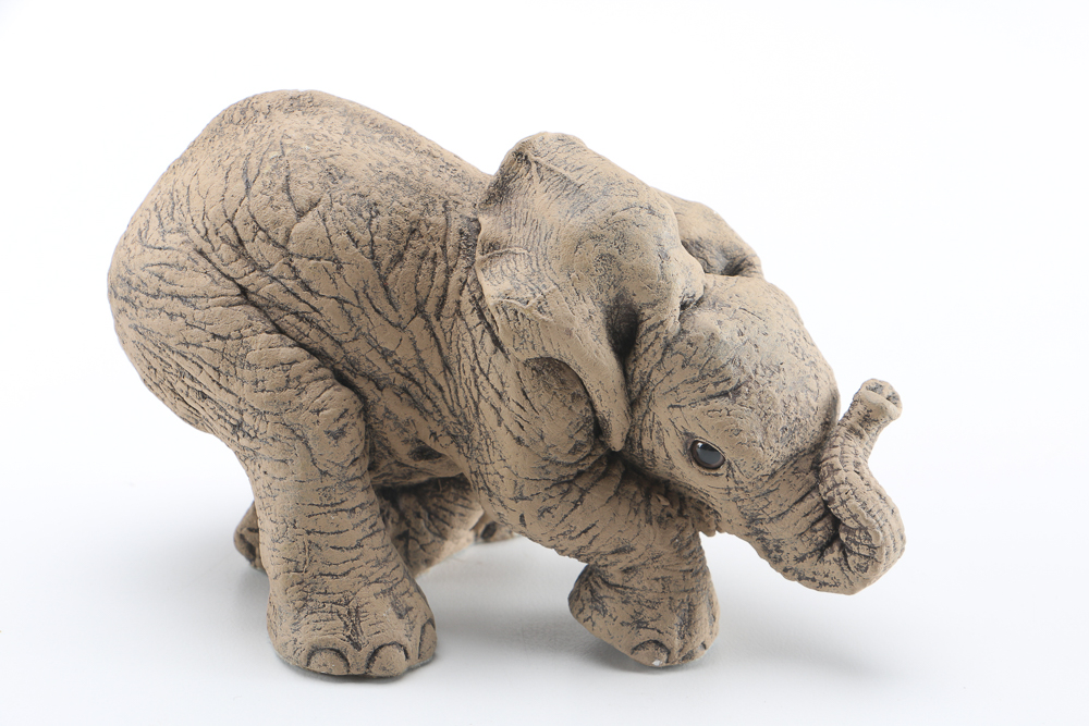 Collection of "The Herd" Elephant Figurines by Martha Carey