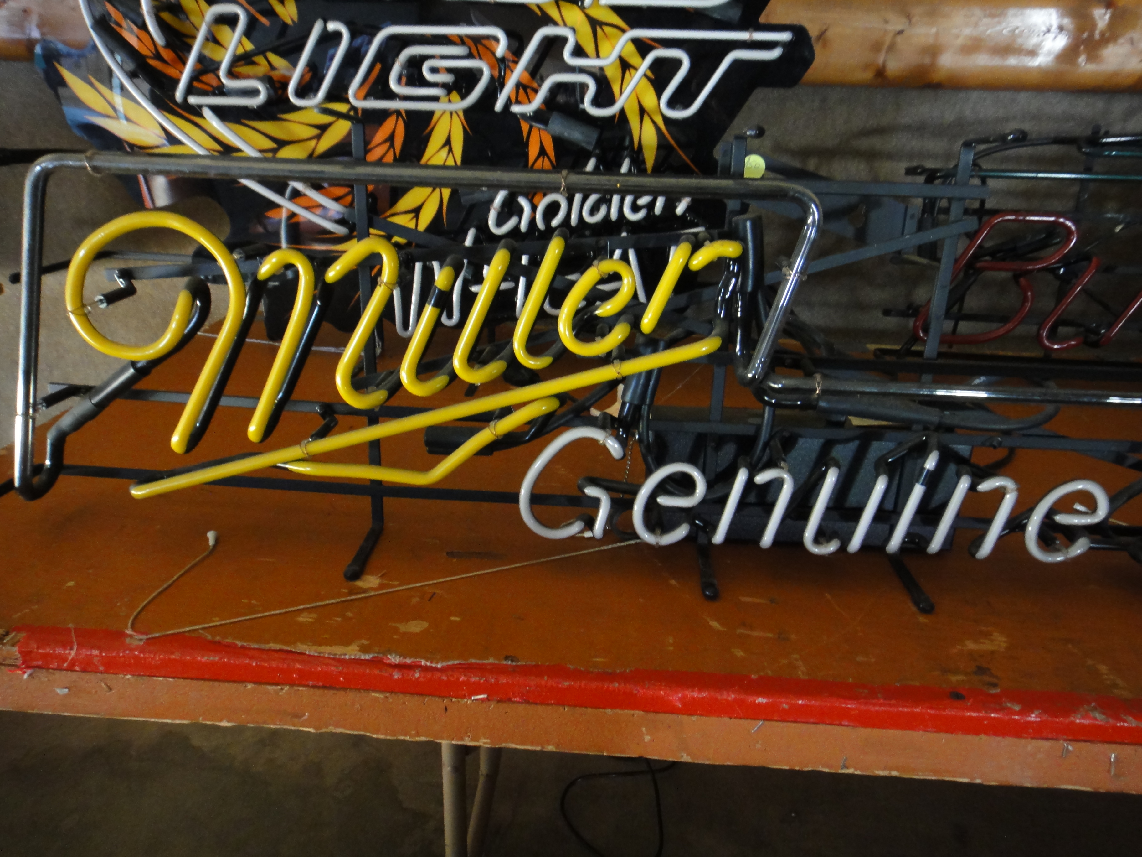 Four Vintage Neon Lighted Beer Signs