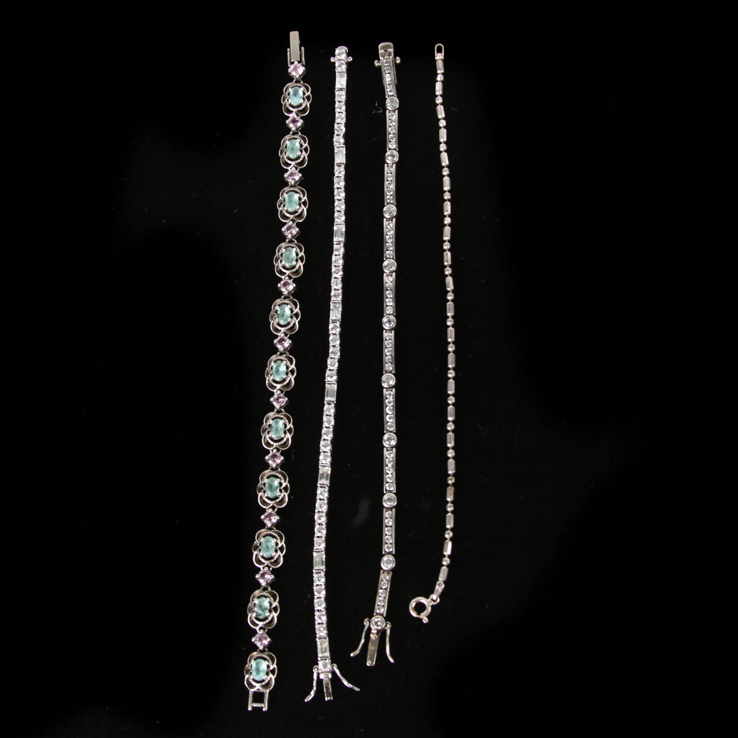 Four Sterling Silver Bracelets