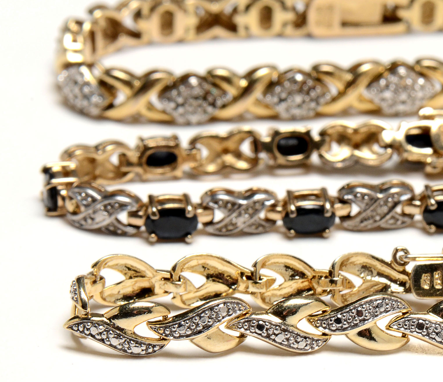 Three Sterling Vermeil Bracelets with Gemstones and Diamonds